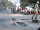 Residents block a road during a service delivery protest